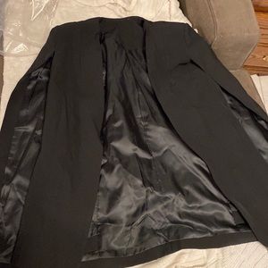 Cape style blazer.
